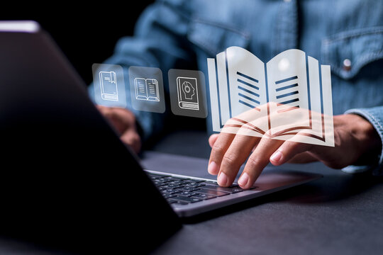 E-library concept. Person using laptop with virtual Ebook icons for electronic books online, knowledge base on internet, digital library or e-library.