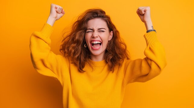 Portrait of a screaming woman with long brunette hair, expressing emotion in a studio setting.
