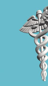 3D rendered silver color caduceus, symbol of medicine and related sciences, coming with dolly out to frame on blue background. 4K resolution, large copy space.