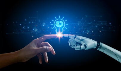 Hands of robot and human touching virtual AI brain data creative in light bulb. Innovation...