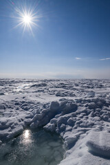 Ice hummocks on the ice in winter