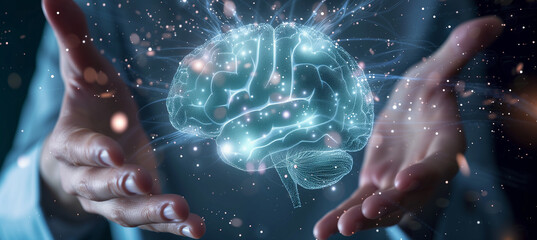 Futuristic concept of a holographic human brain being examined by hands in mid-air. The holographic brain glows in blue and green hues, creating a futuristic and technological atmosphere.