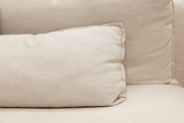 pillows on sofa in living room. close up home interior concept soft pillow in bedroom. home sweet...
