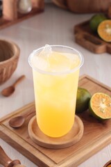 fresh orange juice with ice cubes