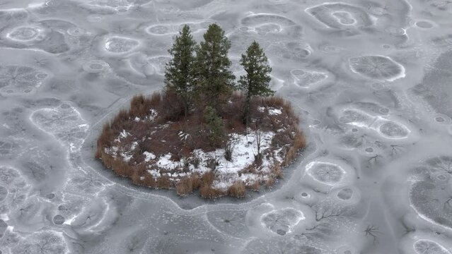Nature's Sculpture: Frozen Canvas - McQueen Lake and Lobely Island