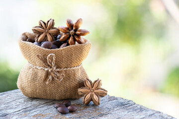 Plukenetia volubilis or Sacha inchi dried fruits and seeds on natural background.
