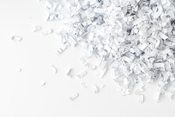 Shredded paper on white background close up