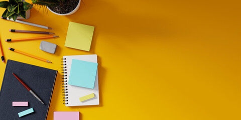 Copy space background with study items on a yellow desk.3d rendering