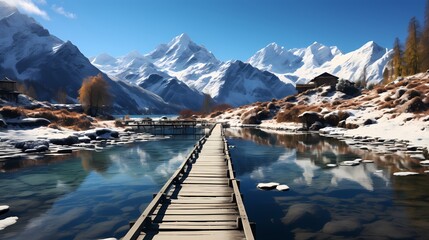 A frozen lake with a wooden pier stretching out into the icy water, surrounded by snow-covered mountains and a clear blue sky above - obrazy, fototapety, plakaty