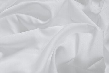 Obraz premium Soft focus white smooth ripple linen fabric on detail texture background