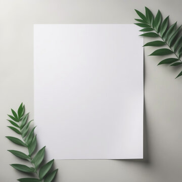Blank empty cardstock sheet Invitation without text, invitation mockup. Fresh green tropical leaf, beige desk. Flat lay, top view. Soft paper card mock up. Modern Minimal business brand template. A4