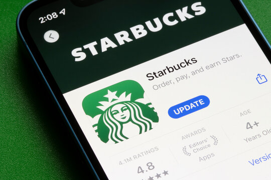 Portland, OR, USA - Dec 9, 2022: Starbucks app is seen in the App Store on an iPhone. Starbucks is a coffee company and a chain of coffeehouses headquartered in Seattle, Washington.