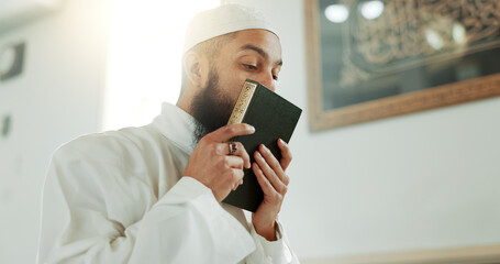 Islam, kiss and man in mosque with Quran, mindfulness and gratitude in faith reading. Worship,...