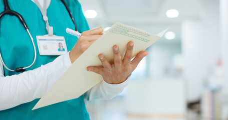 Nurse, writing and hands on folder in hospital or document for insurance, healthcare and report...