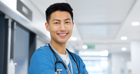 Healthcare, face and asian man or doctor with smile for wellness, trust and service in hospital or...