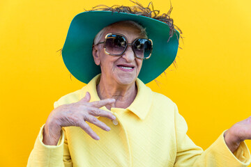 Funny grandmother portraits. Senior old woman dressing elegant for a special event. Concept about seniority - 733637617