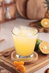 fresh orange juice with ice cubes