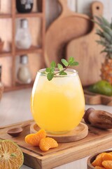 fresh orange juice with ice cubes