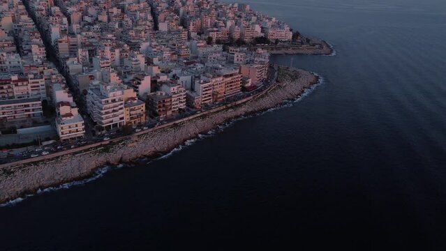 This video was made with a drone, It's a neighbourhood in Athens, which is located near the sea, called Piraiki(also Peiraiki) made at a sunny day