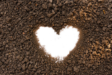 Heart shape in fertile soil. Environmentally friendly concept Carbon dioxide emissions, Carbon...