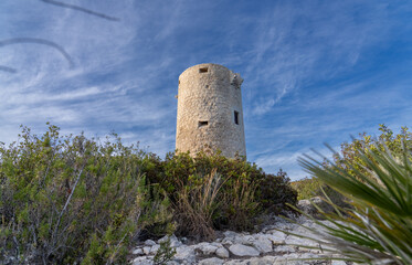 Fototapeta na wymiar Torre Badum, Sentinel Tower on the cliffs of the Sierra de Irta, spain