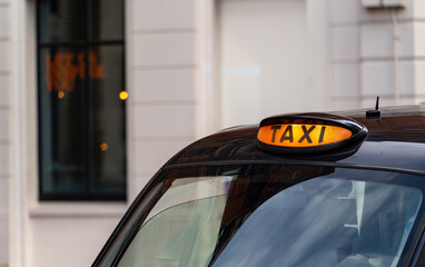 Taxi with it's sign on ready for hire