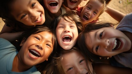 Joyful Children Laughing Together in a Circle Outdoors