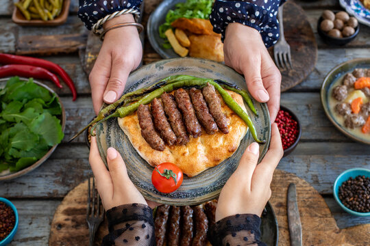 Grilled burgers on the pita bread named cevapi , souvlaki , şiş or ineg&ouml;l k&ouml;fte