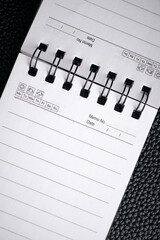 A close-up notebook with a place for writing. Task planning