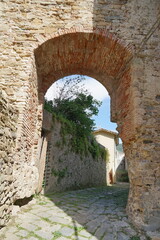 Ancient medieval gate in Riale street in Vicopisano, Tuscany, Italy
