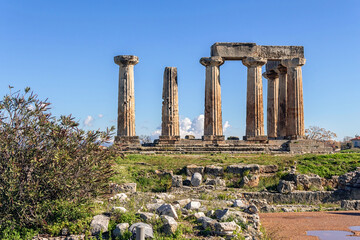 Doric Temple of Apollo on city ruins, general view. Archeological park at Ancient Corinth, Greece