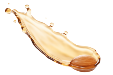 Levitation of almond nut in oil isolated on transparent background.