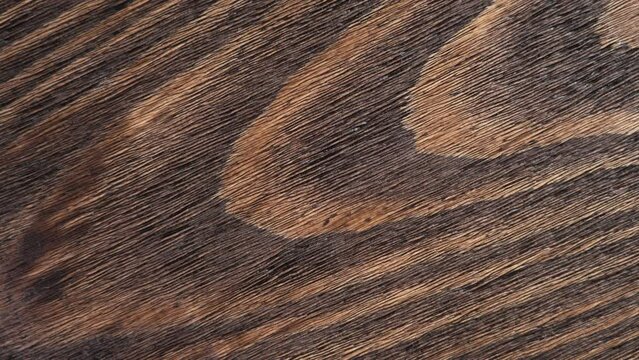 Wood texture with old natural pattern. Textured aged board surface. Rotation