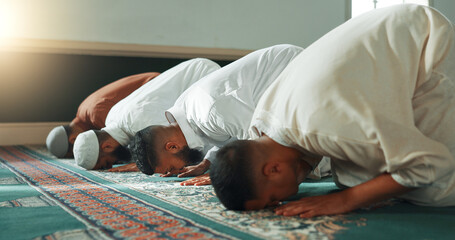 Muslim, praying and men in a Mosque for spiritual religion together as a group to worship Allah in...