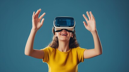 Cheerful girl with hands up wearing a VR headset, radiating excitement in a bright yellow top against a blue backdrop.