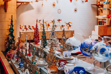 New Year decorations in a Christmas market stall. Italy, Milan.
