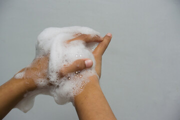 Hand wash full of soap bubbles