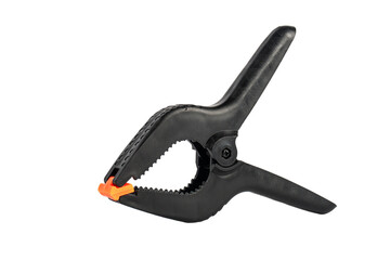 Black plastic spring clamp isolated on transparent background