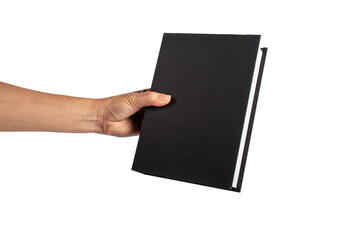 Blank black book cover in hand on transparent background.