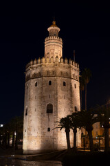 Fototapeta na wymiar Tower Of Gold At Night In Seville, Spain
