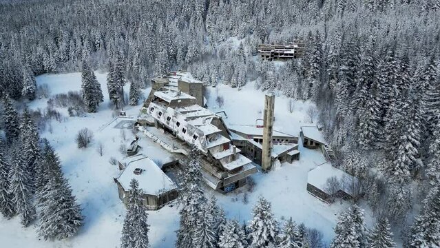 Aerial view of the destroyed Hotel Igman during winter time. The hotel was built in Mount Ingman for the Winter Olympic Games held in Sarajevo in 1984.