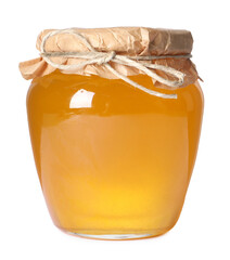 Tasty natural honey in glass jar isolated on white