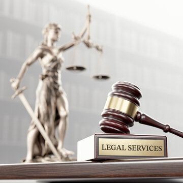 Legal Services: Judge's Gavel as a symbol of legal system and wooden stand with text word