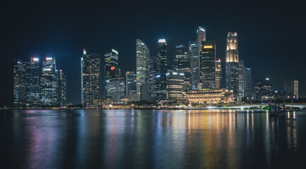 Fototapeta na wymiar Skyline of Singapore - Panorama with reflection