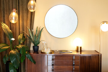 Dressing table with decorative elements in room. Mid century room in home with modern interior...