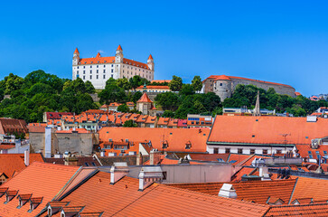 Bratislava, Slovakia: Panoramic rooftop view of Bratislava Castle, the cathedral and the old town - 733735435