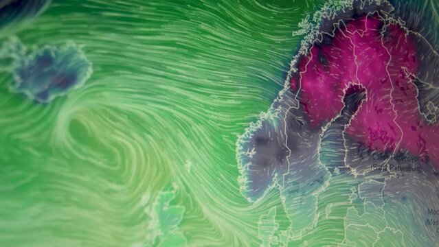 Weather wind temperature over Scandinavia Russia Sweden. Shot of a computer screen monitor. Pixels visible. Weather wind temperature over Scandinavia Russia Sweden. Moving camera shot of a computer sc
