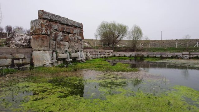 Eflatun Pinar ( Eflatunpinar) Ancient Hittite relief sculpture monument and sacred pool, and its Hittite relief scultures of Hittite gods, Beysehir, Konya Turkey