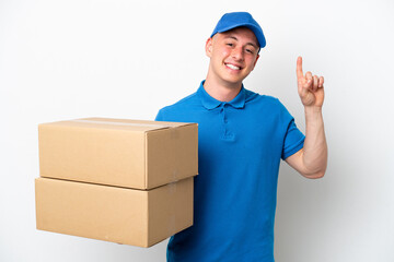 Young delivery Brazilian man isolated ops white background pointing up a great idea