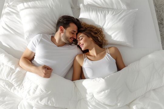 A married couple is basking in bed